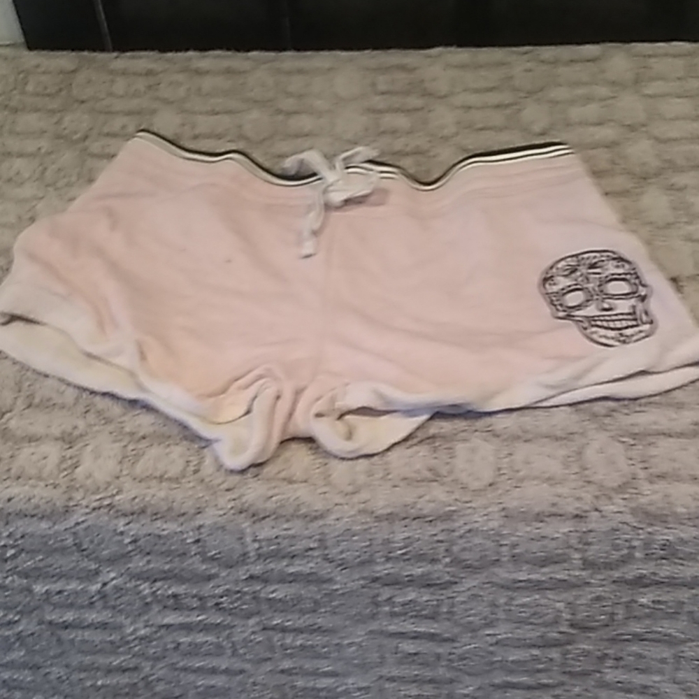 Light pink skull shorts
